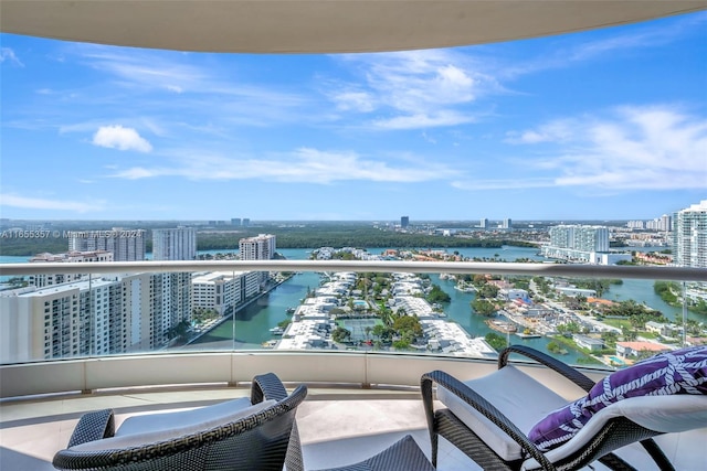 balcony featuring a water view