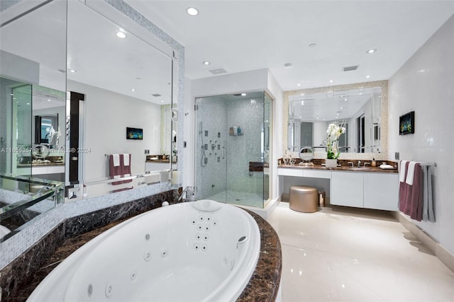 bathroom featuring vanity and plus walk in shower