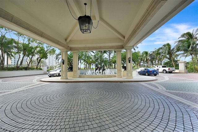 exterior space featuring ceiling fan