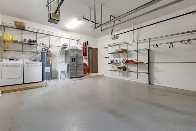 garage with a garage door opener, water heater, stainless steel fridge with ice dispenser, and separate washer and dryer