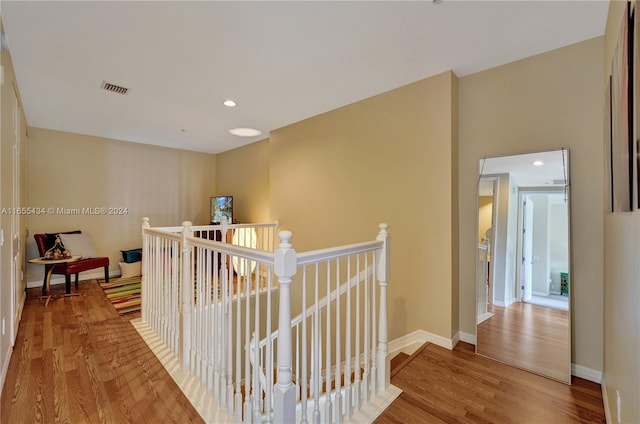 hallway featuring hardwood / wood-style flooring