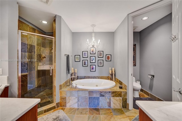 full bathroom featuring vanity, an inviting chandelier, toilet, and independent shower and bath