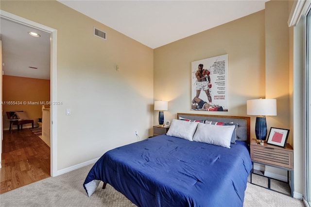 bedroom featuring hardwood / wood-style flooring