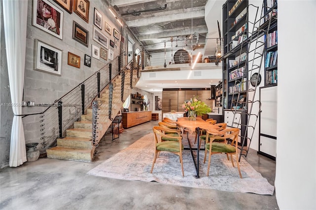 dining room featuring concrete flooring