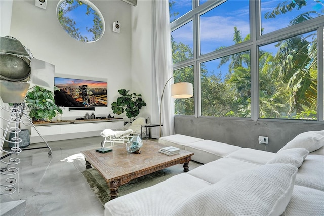 living room with concrete floors