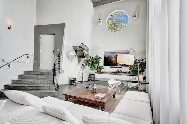 living room featuring concrete floors