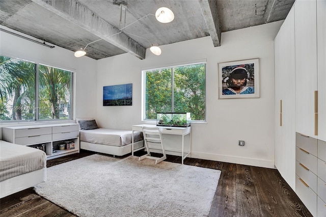 bedroom featuring dark hardwood / wood-style flooring