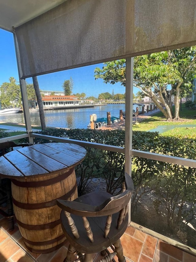 view of patio featuring a water view