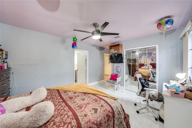 bedroom featuring a closet and ceiling fan