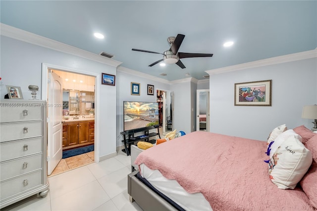 tiled bedroom with ensuite bath, ornamental molding, and ceiling fan