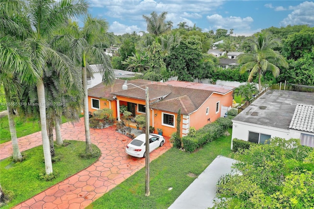 exterior space with a front yard