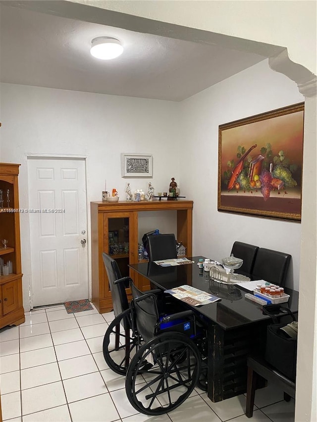 office area with light tile patterned flooring