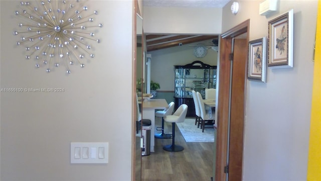 hallway with wood finished floors