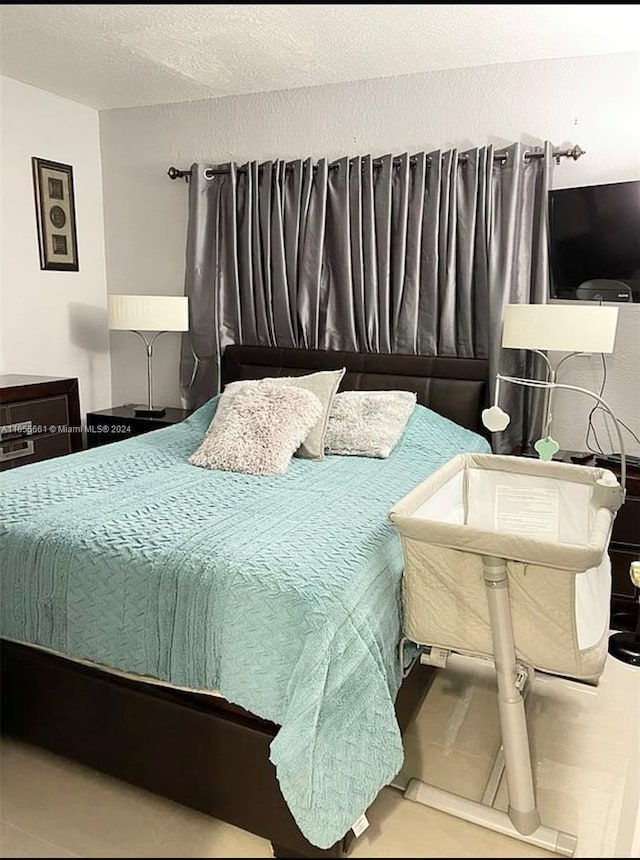 bedroom with a textured ceiling