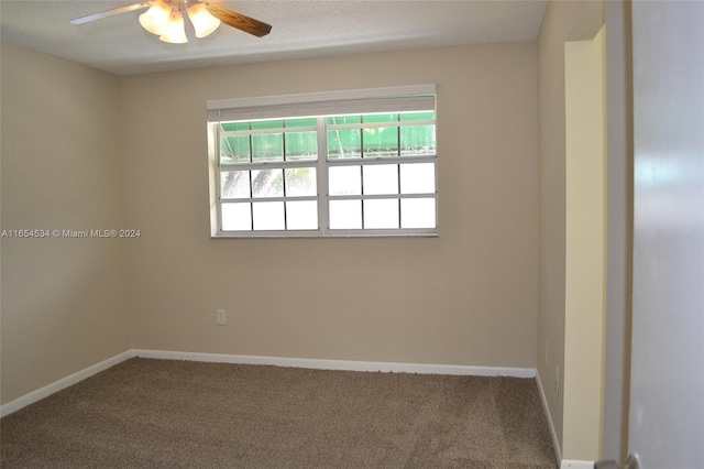 unfurnished room featuring carpet flooring and ceiling fan