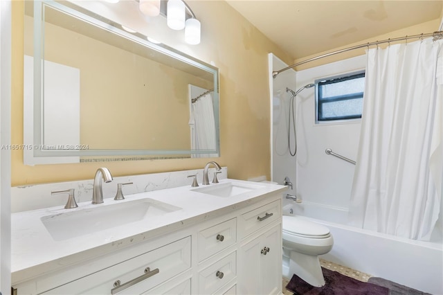 full bathroom with vanity, toilet, and shower / tub combo with curtain