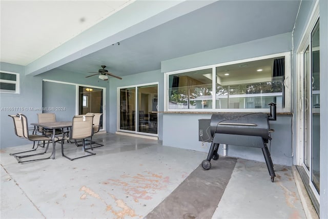 view of patio featuring ceiling fan