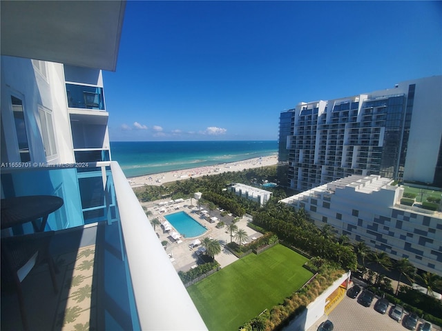 exterior space with a beach view and a water view