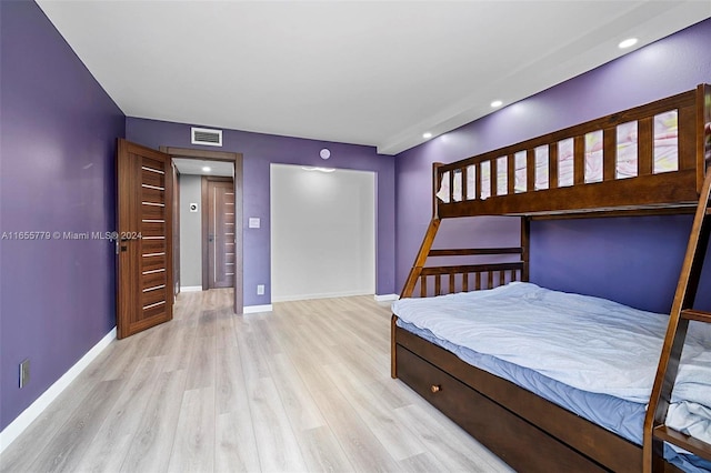 unfurnished bedroom with light hardwood / wood-style floors