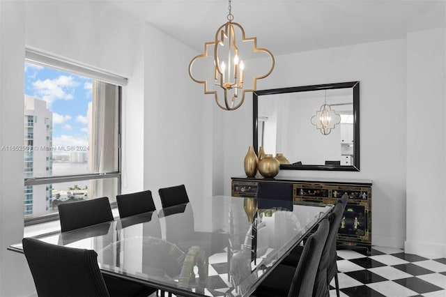 dining space featuring a notable chandelier