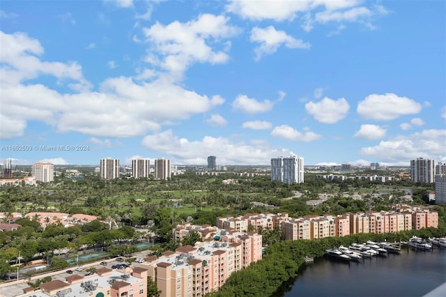 property's view of city featuring a water view