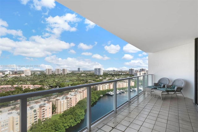 balcony featuring a water view