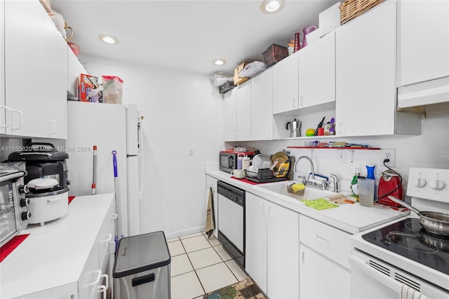 kitchen featuring white appliances, white cabinetry, and sink