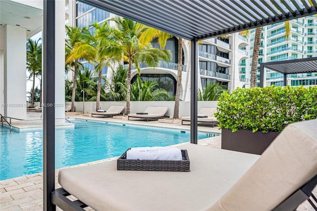 view of swimming pool featuring a patio