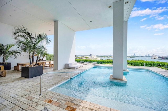 view of pool featuring a patio area