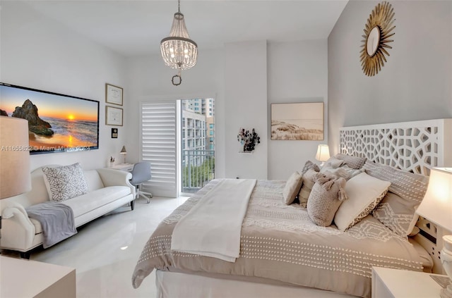 bedroom featuring an inviting chandelier and access to outside