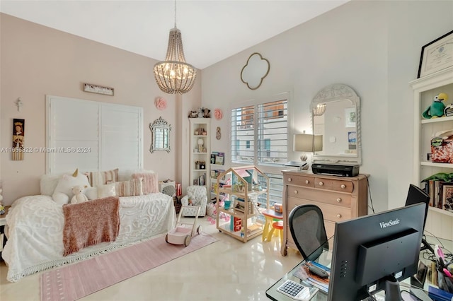 bedroom featuring an inviting chandelier