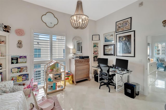 office featuring an inviting chandelier