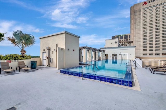 view of pool with a patio