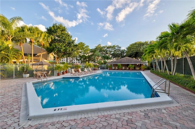 view of pool featuring a patio area