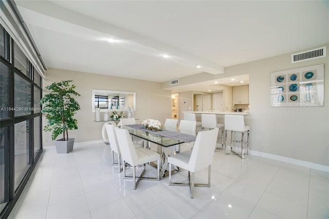 dining area with light tile patterned floors