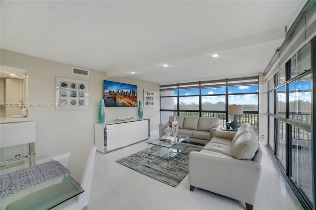 living room with a wall of windows