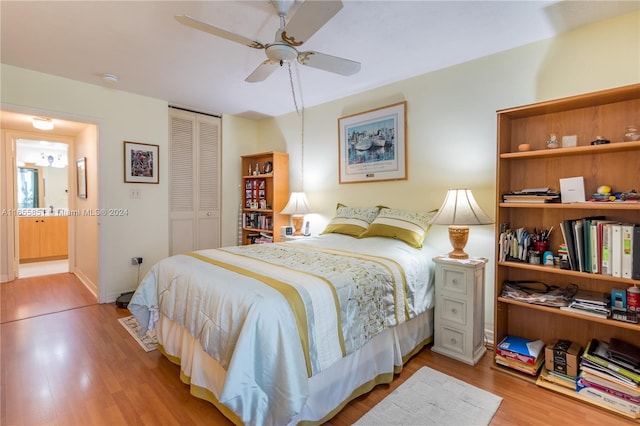 bedroom featuring a closet, ceiling fan, and light hardwood / wood-style floors