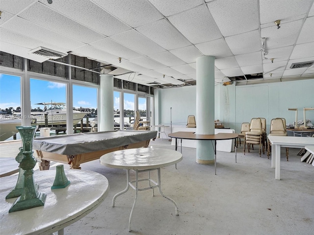 interior space with pool table and a drop ceiling