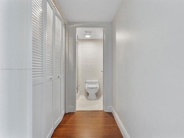 hall featuring wood-type flooring