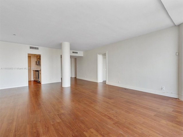 interior space with hardwood / wood-style floors