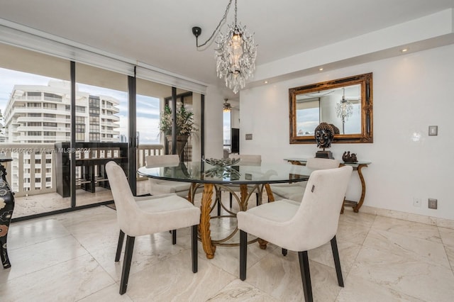 dining room featuring a notable chandelier