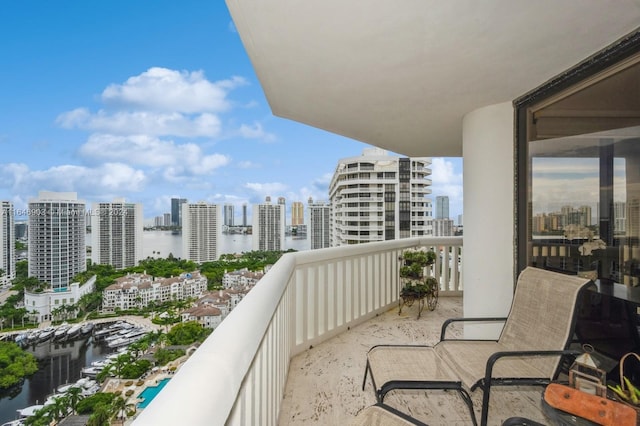 balcony featuring a water view