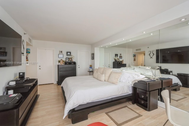 bedroom featuring light hardwood / wood-style floors