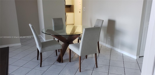 view of tiled dining space