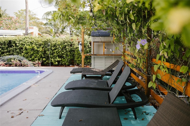 view of patio featuring an empty pool