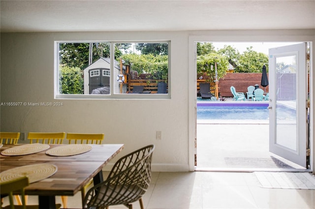 dining room featuring tile patterned flooring