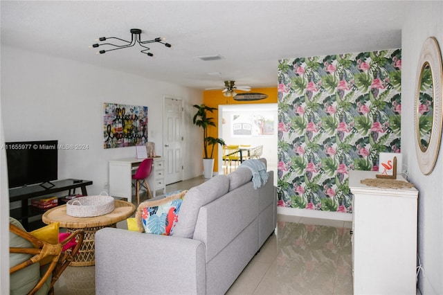 living room with light tile patterned floors and ceiling fan