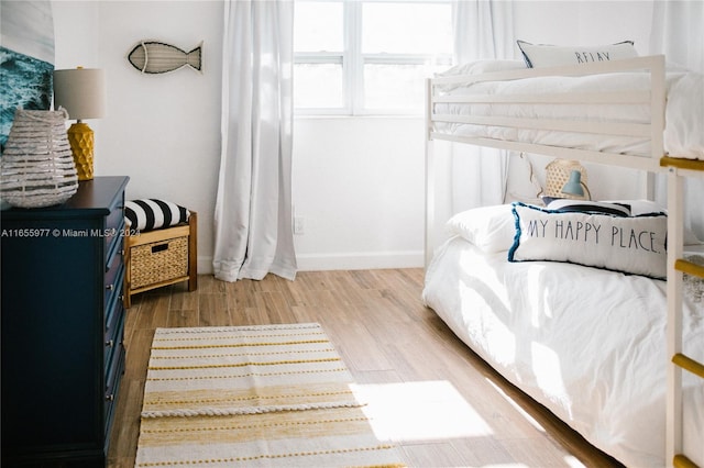 bedroom featuring hardwood / wood-style flooring