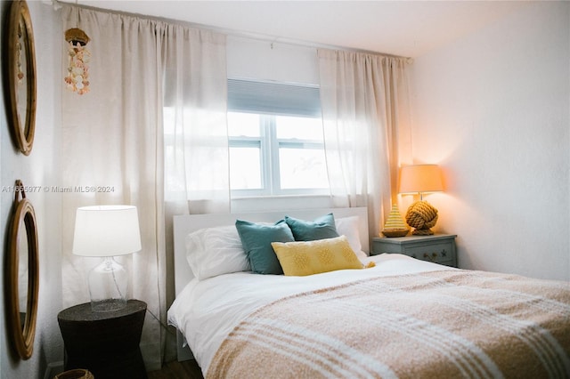 bedroom featuring hardwood / wood-style flooring