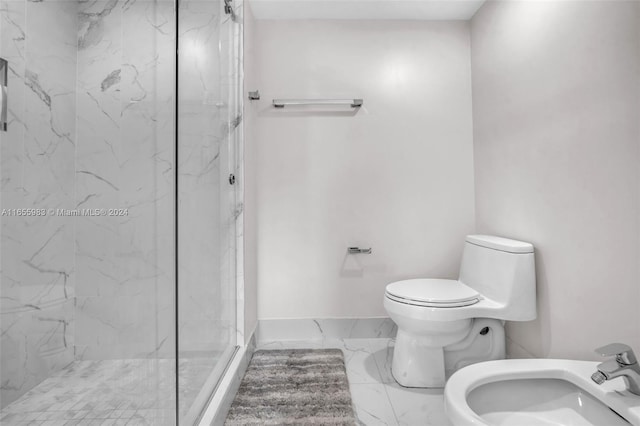 bathroom featuring toilet, sink, a bidet, and a shower with shower door